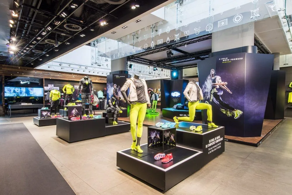 Inside a Nike store with apparel and footwear displays